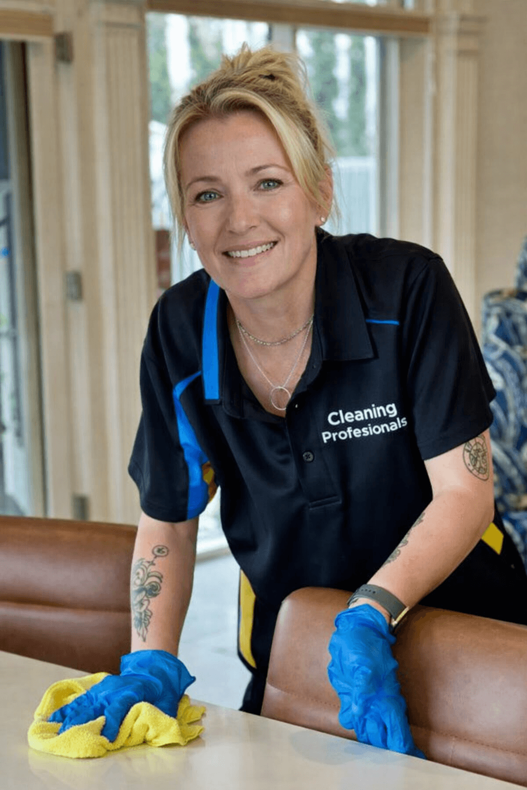 Professional cleaner from Cleaning Professionals — insured, trained bond and end of lease cleaning in Canberra